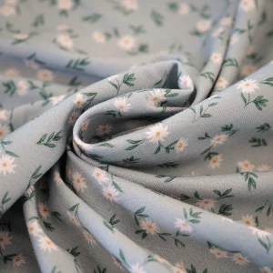 tissu jersey vert de gris motif fleuri