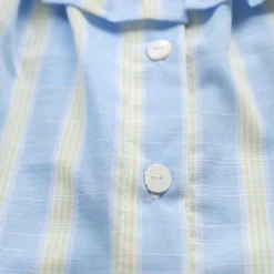 bouton coquillage sur tissu rayures